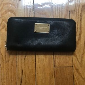 Michael Kors black wallet with gold zipper